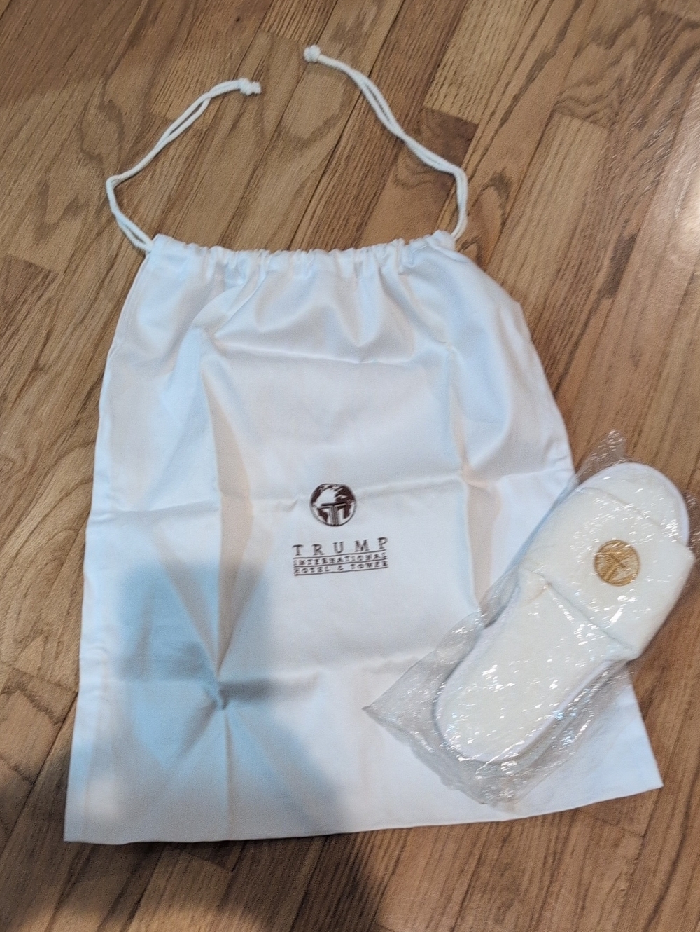 TRUMP International White Hospitality Drawstring  Bag with Slippers